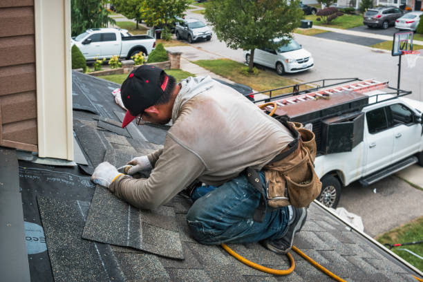 Professional Roofing technician working in Huntley, MT